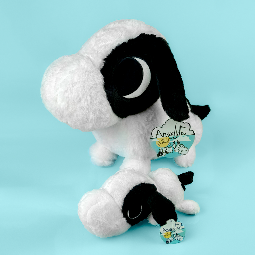 Plush toy of ADHD Puppy, the black and white puppy, in large and small size