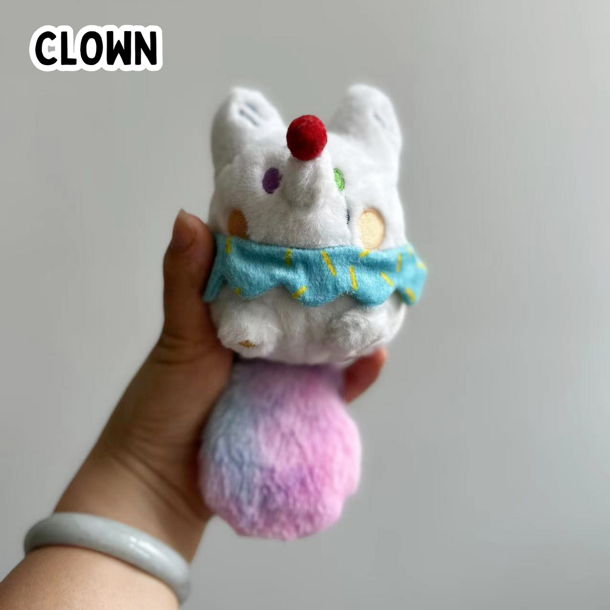 Made By Nao! Pocket Friends plush toy featuring a colorful clown with soft fabric and embroidered details.