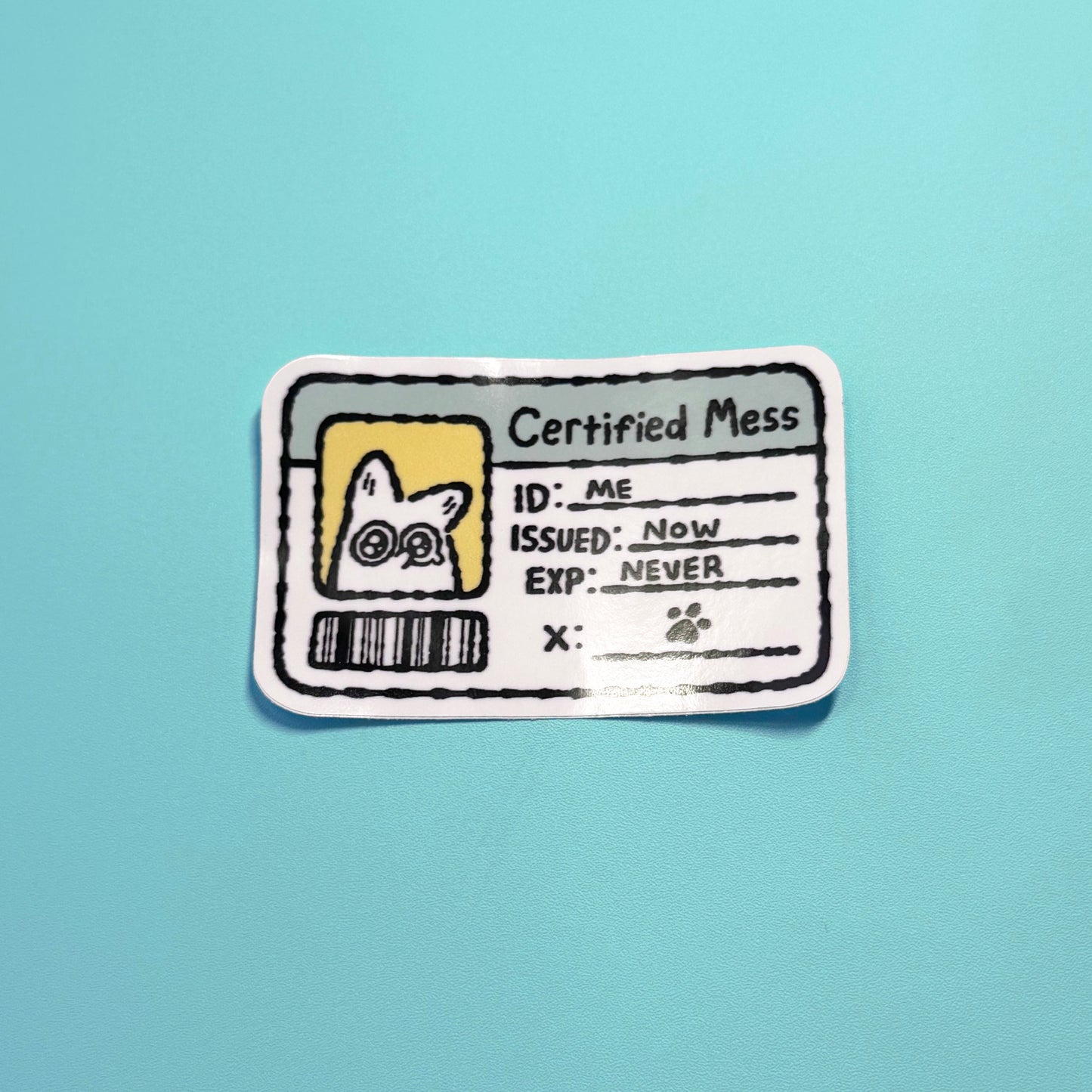 Sticker with 'Certified Mess' design on a light blue background