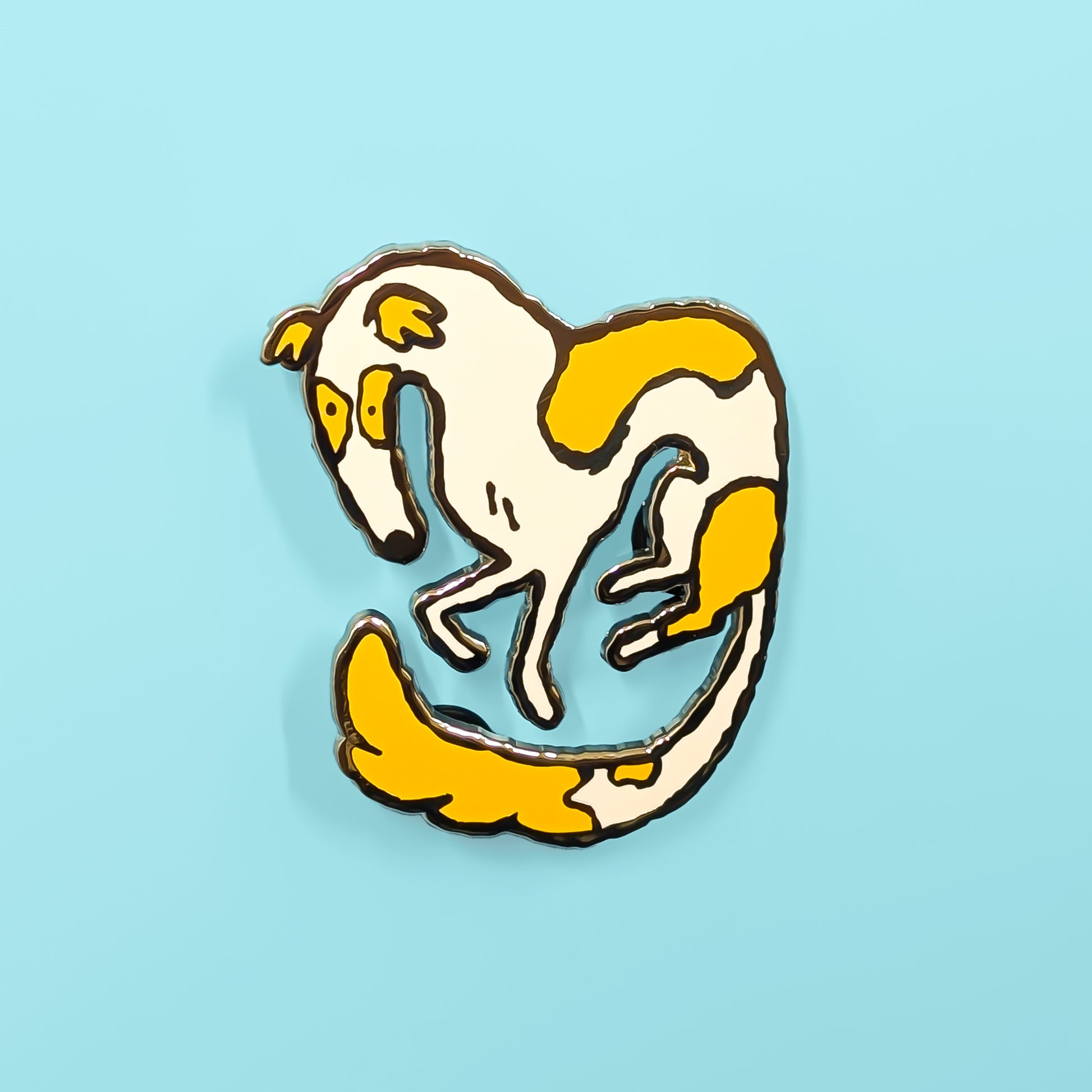 Enamel pin of a Borzoi on a blue background