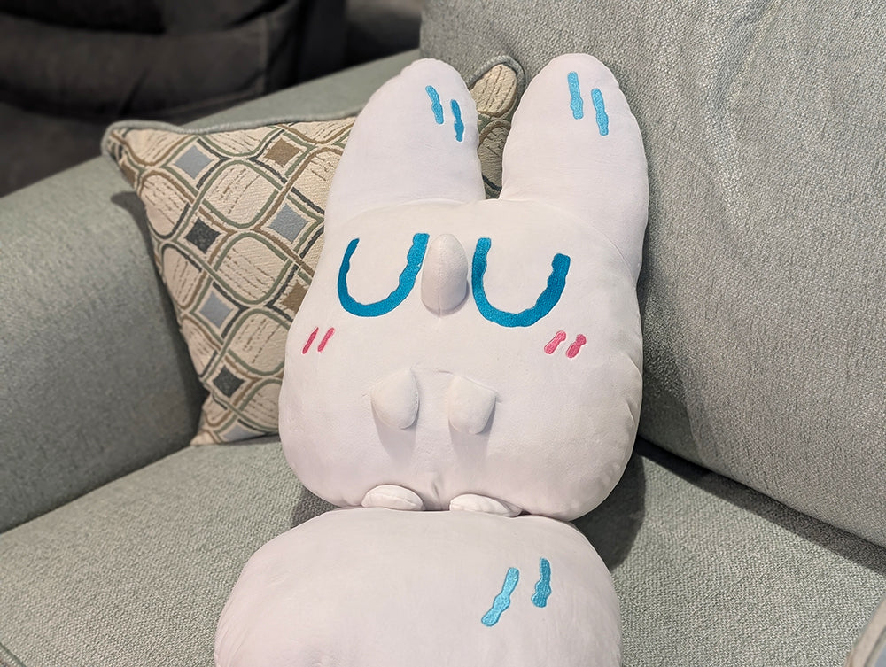 Close-up of the Gentle Friends Jumbo Anxiety Fox plush toy by Made by Nao!, featuring soft fabric and expressive embroidered eyes.