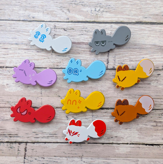 Colorful Smol Feelings enamel pin by Made By Nao!, featuring a cute, expressive design perfect for accessorizing clothing or bags.