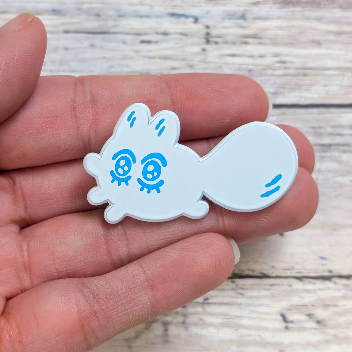 Made By Nao! Smol Feelings enamel pin featuring a cute Sugoi Hold character on a white background.