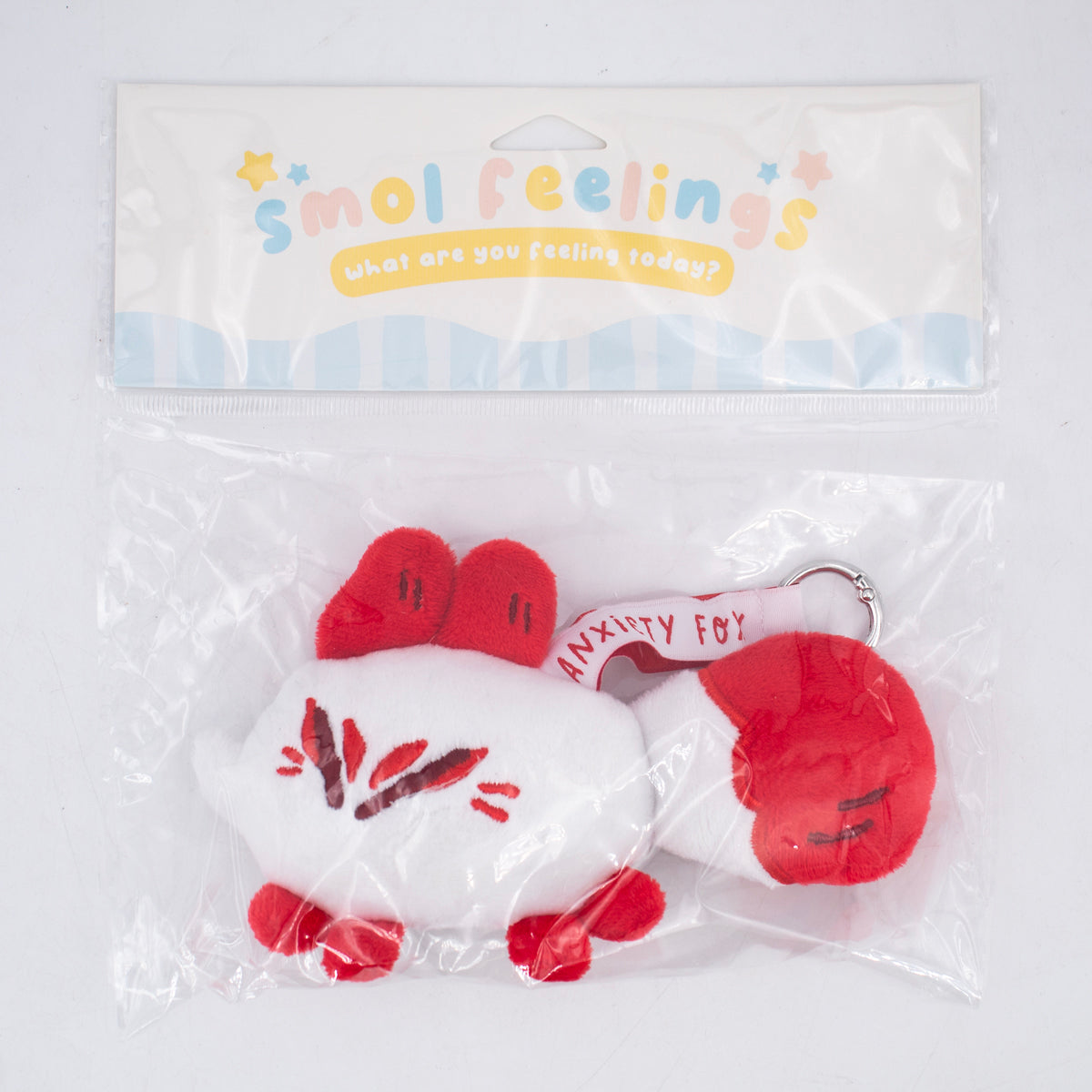 Smol Feelings plush toy by Made By Nao! featuring a cute kitsune fox with soft, colorful fabric and expressive embroidered eyes.