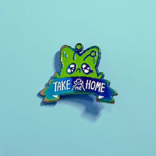 Alien "Take Me Home" anxiety fox enamel pin by Made By Nao! featuring a colorful, detailed fox design on a metal pin backing.