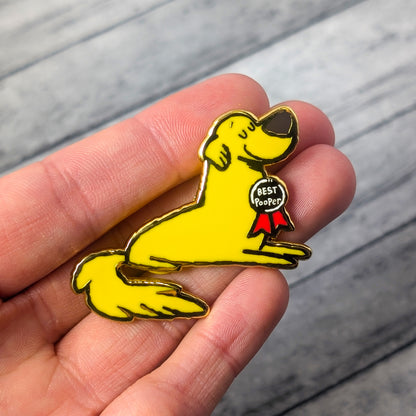 Golden Retriever Good Pooper enamel pin by Made By Nao! featuring a cute dog design on a metal pin with vibrant details.
