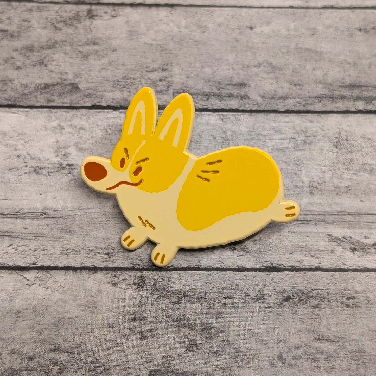 Pembroke Welsh Corgi enamel pin by Made By Nao! featuring a cute Corgi dog in vibrant enamel colors.