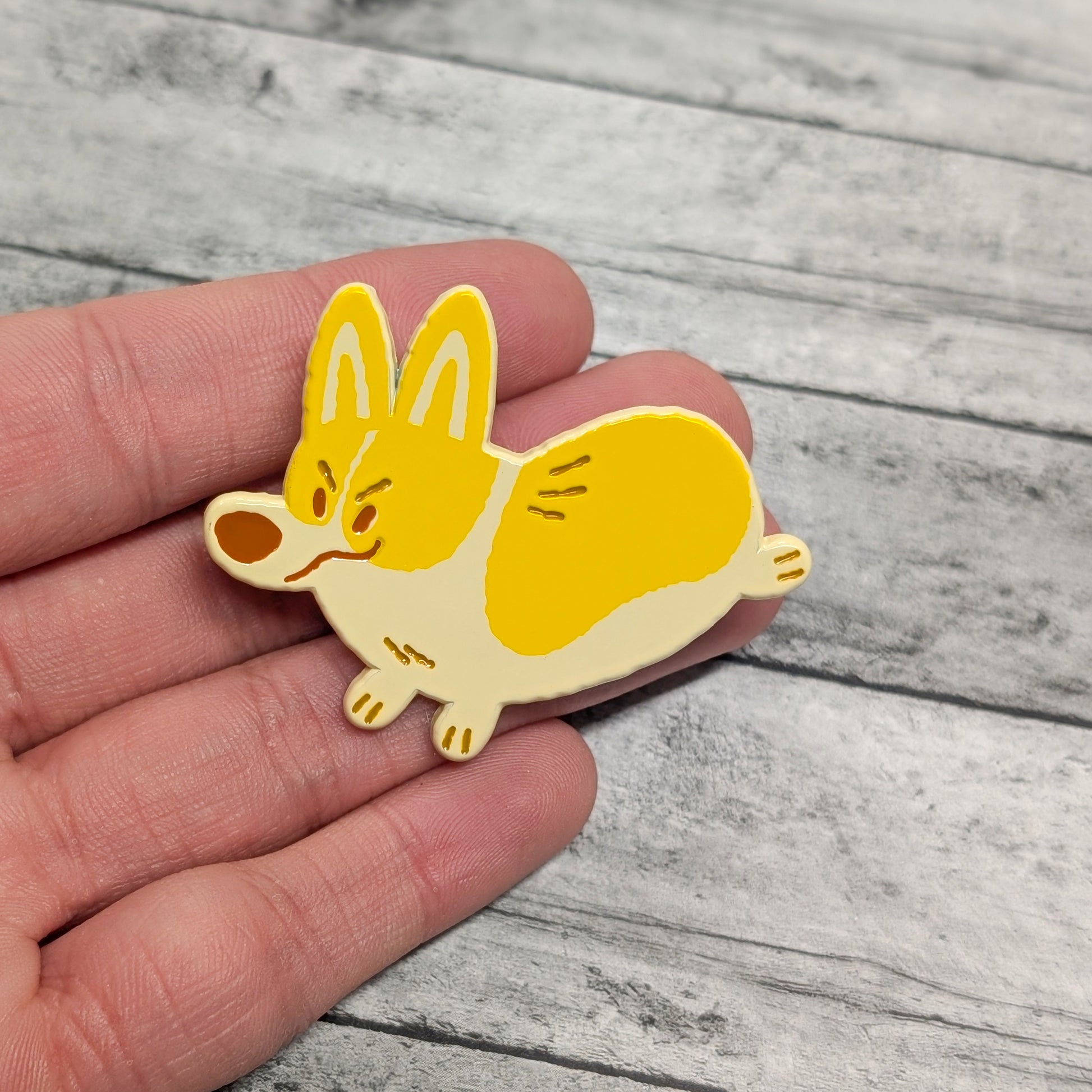 Pembroke Welsh Corgi enamel pin by Made By Nao! featuring a cute Corgi design on a metal pin backing.