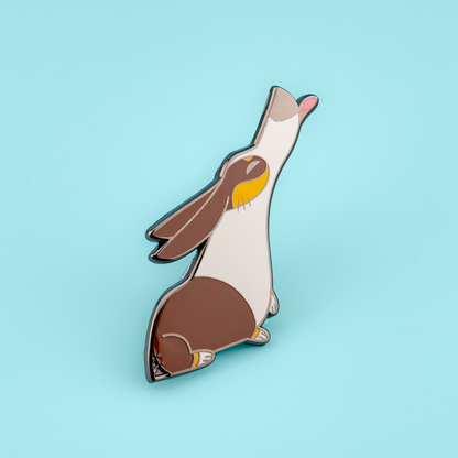 Tricolor Pembroke Welsh Corgis enamel pin by Made By Nao! featuring detailed dog design on a metal badge.