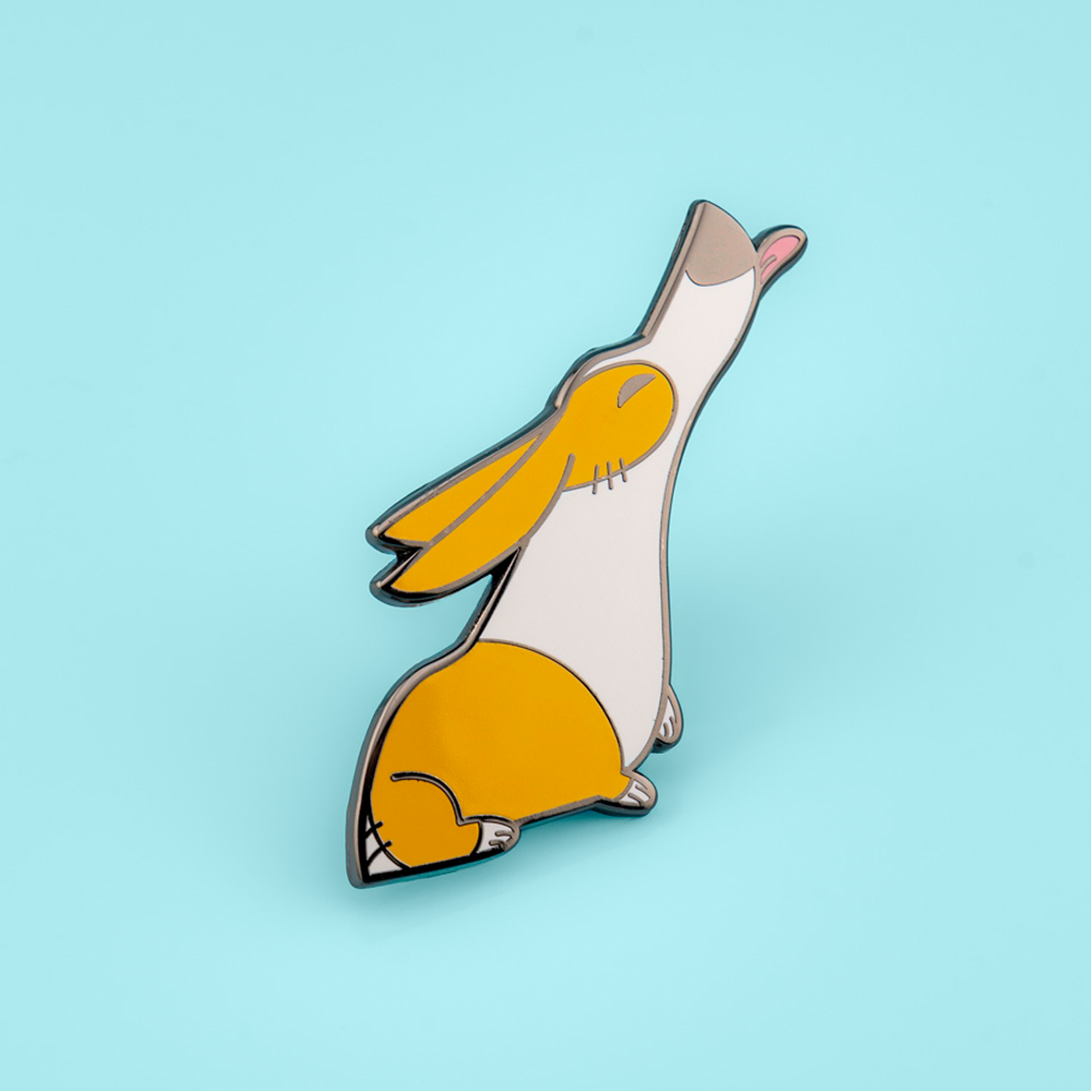 Orange Pembroke Welsh Corgis enamel pin by Made By Nao! featuring cute dog designs on a metal pin back.