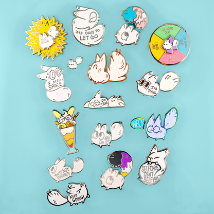 Enamel pin featuring a cute fox design with "I Need Space" text, made by Made By Nao!