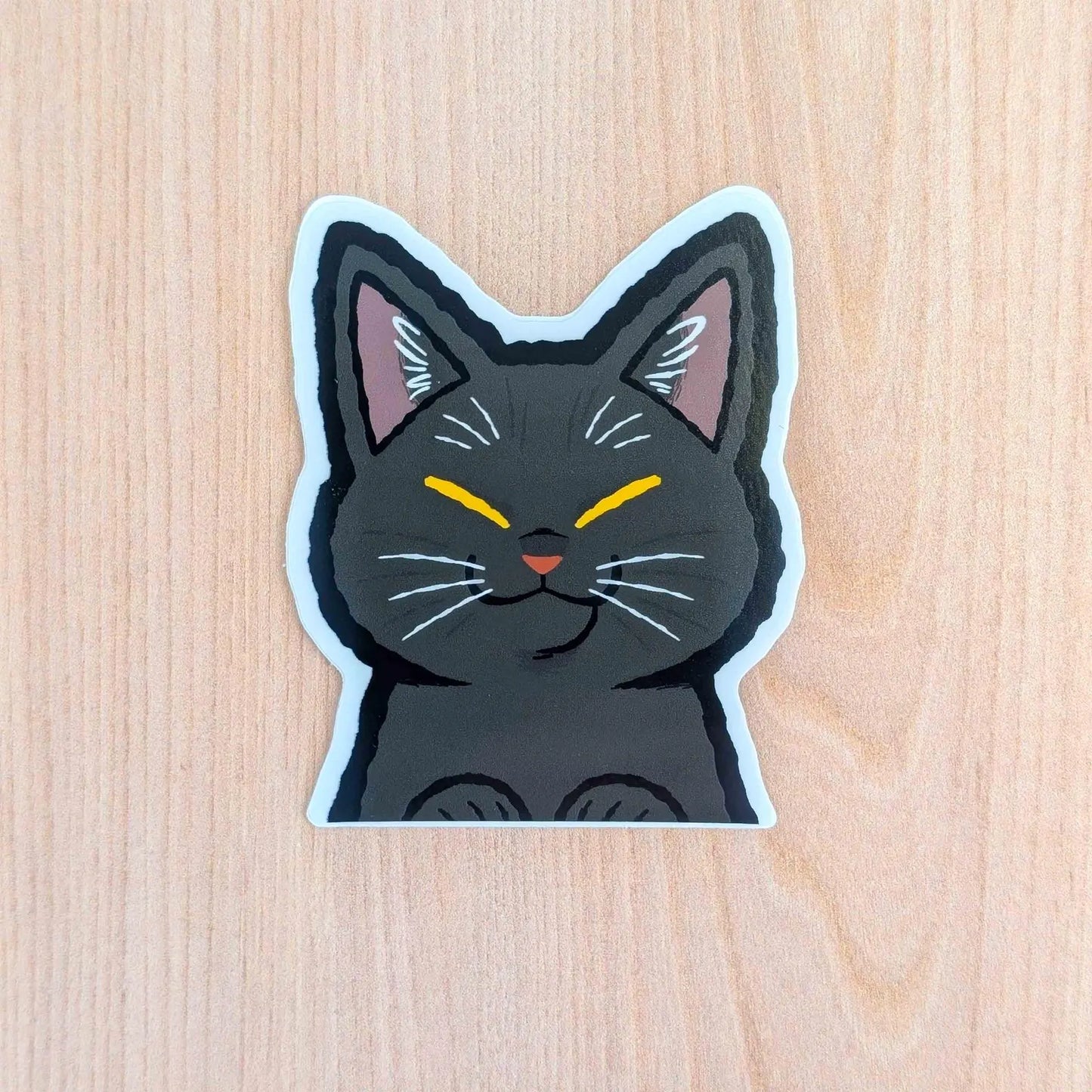 Black Cat Peeker vinyl sticker by Made By Nao! featuring a playful black cat peeking design on durable adhesive sticker.
