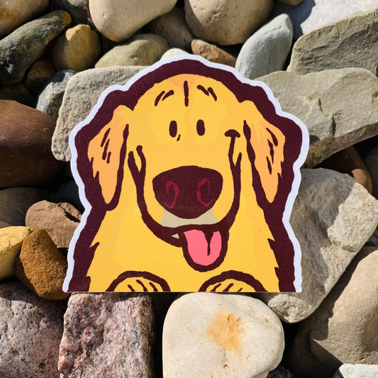 Weatherproof vinyl sticker of a golden retriever peeker, made by Made By Nao!, featuring a cute dog design.