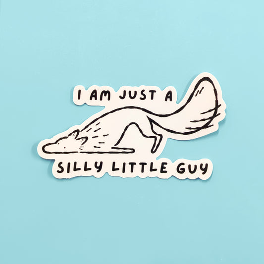 Cute wolf vinyl sticker from Made By Nao! featuring a playful, cartoon-style wolf character on a clear background.