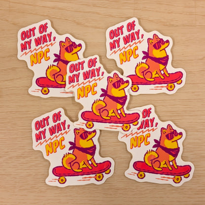Shiba Inu vinyl sticker from Made By Nao! Featuring the "Out of My Way, NPC" design, perfect for decorating laptops or notebooks.