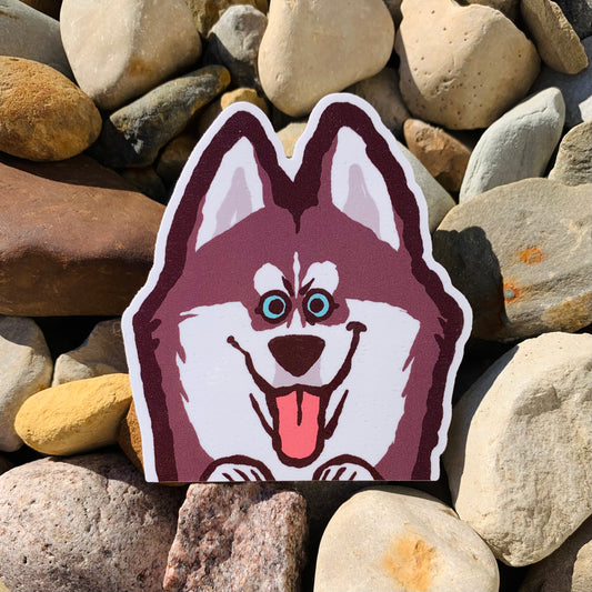 Weatherproof Siberian Husky vinyl sticker by Made By Nao! featuring a detailed husky face for decorating laptops or water bottles.
