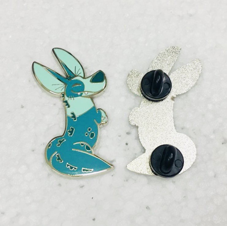 Kaiju Corgi enamel pin by Made By Nao! featuring a cute, colorful corgi dressed as a kaiju monster.