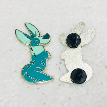 Kaiju Corgi enamel pin by Made By Nao! featuring a cute, colorful corgi dressed as a kaiju monster.